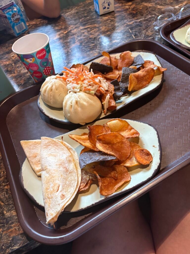Food from Satu'li canteen - bowls of food with giant prawns and some bao buns