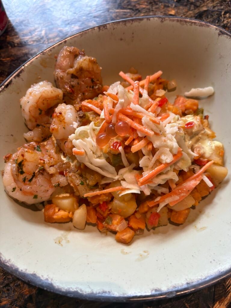 Food from Satu'li canteen - bowls of food with giant prawns and some bao buns