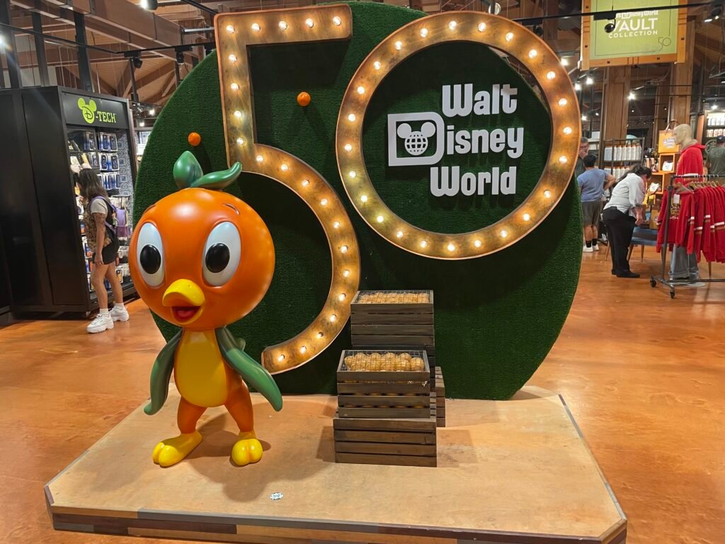 Orange bird with a 50 sign in the Disney springs area of Walt Disney World. Image used to advertise the Disney Planning Power Hour!